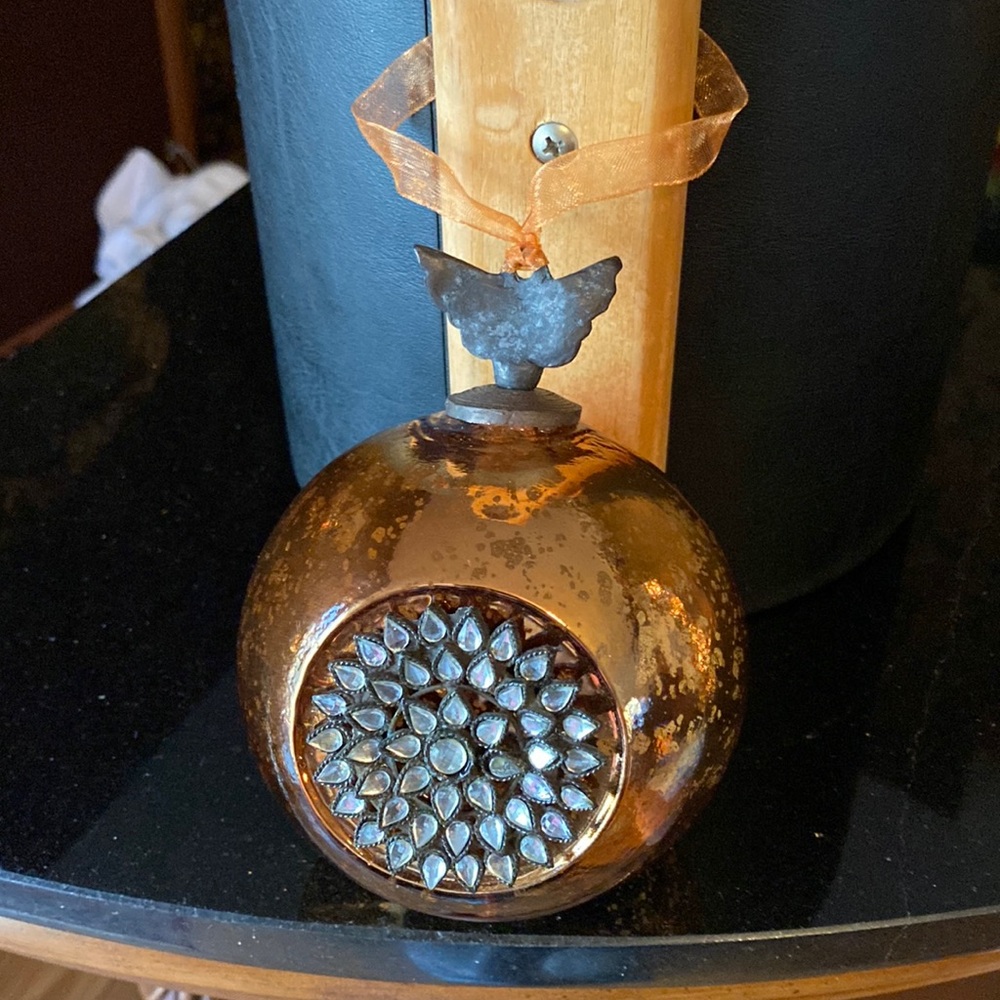 Three beautiful copper ornaments.  (Found a third)